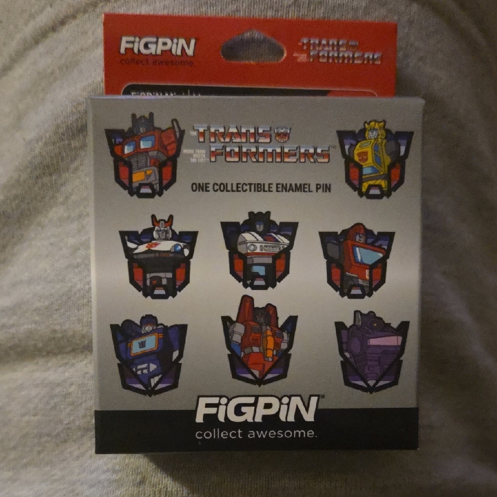 1 . Transformers Collectible Mystery Enamel Pin